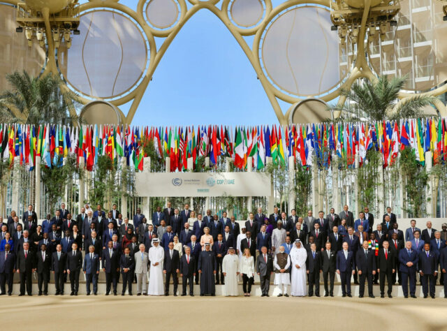 DECEMBER 1: World Heads of States pose for a group photo at Al Wasl during the UN Climate Change